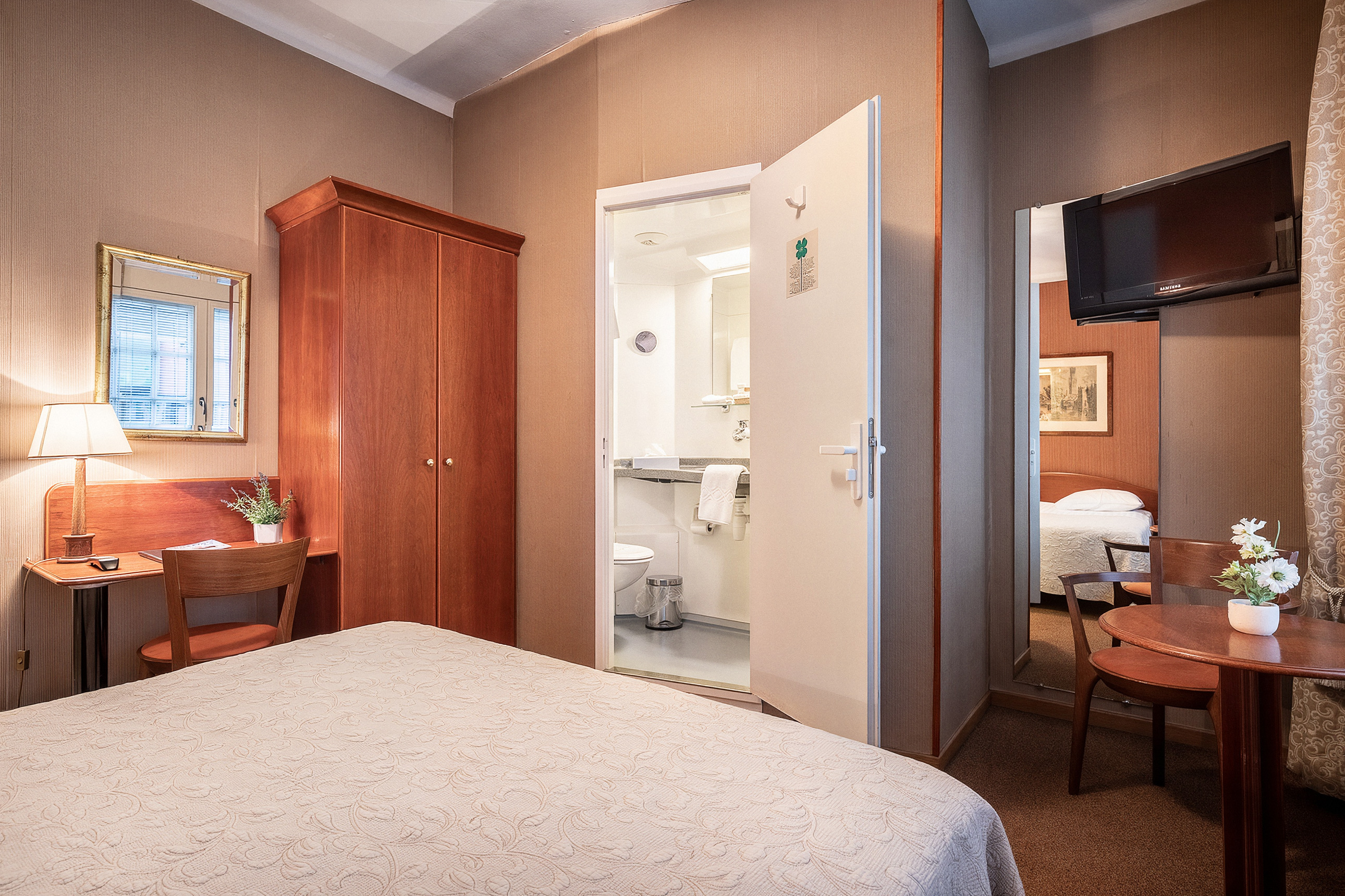 Eenpersoonskamer van Hotel Albert 1